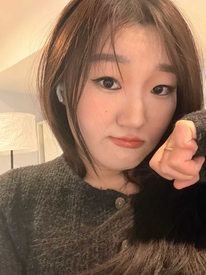 Selfie pointing at the camera